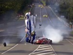 Toyota TS030 hybrid Le Mans prototype flying through the air at 24 Hours of Le Mans