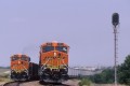 Two BNSF locomotives hauling coal trains meet near Wichita Falls, Texas