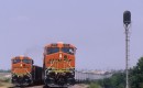 Two BNSF locomotives hauling coal trains meet near Wichita Falls, Texas