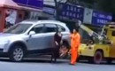 Upset woman has her car towed
