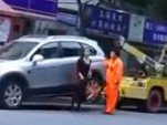 Upset woman has her car towed