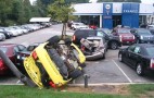 Mustang Rolls Into Cadillac Dealership Hitting Five Cars