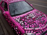 Car decorated with hearts (photo by Flickr user sashafatcat)