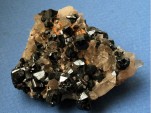 Cassiterite, mined in Tasmania. Image: Ralph Bottrill