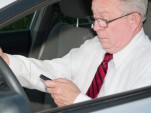 Older driver with phone