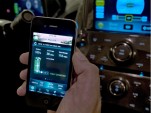 OnStar engineer demonstrates OnStar MyLink for mobile phone applications.