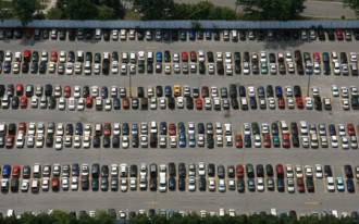 How Do You Park In Crowded Lots: Dive Head First, Or Back It Up?