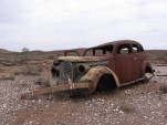 Rusted car, Strezlecki Track, Australia (via Wikimedia)