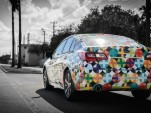 2015 Subaru Legacy Designed By Mondo Guerra To Mark World AIDS Day Specially wrapped 2015 Subaru Legacy by designer Mondo Guerra (photo: Nick D'Amico & Dana Slifer)