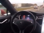 Tesla Model S owner tests Autopilot system from back seat