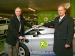 Zipcar's Scott Griffith and Toyota's Frank Miller with a Toyota Prius PHV
